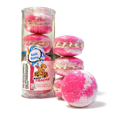 A stack and tube of pink and white bunny tracks bath cookies against a white background
