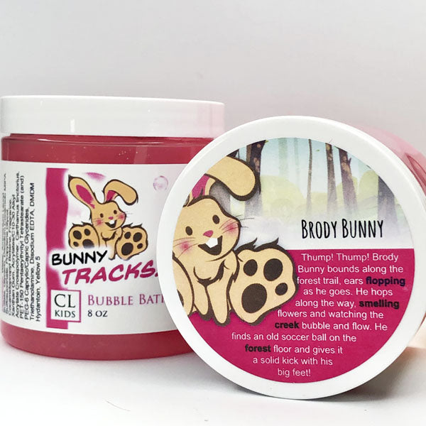 Bunny Tracks Bubble Bath Slime in a container of our pink bunny tracks bubble bath slime against a white background