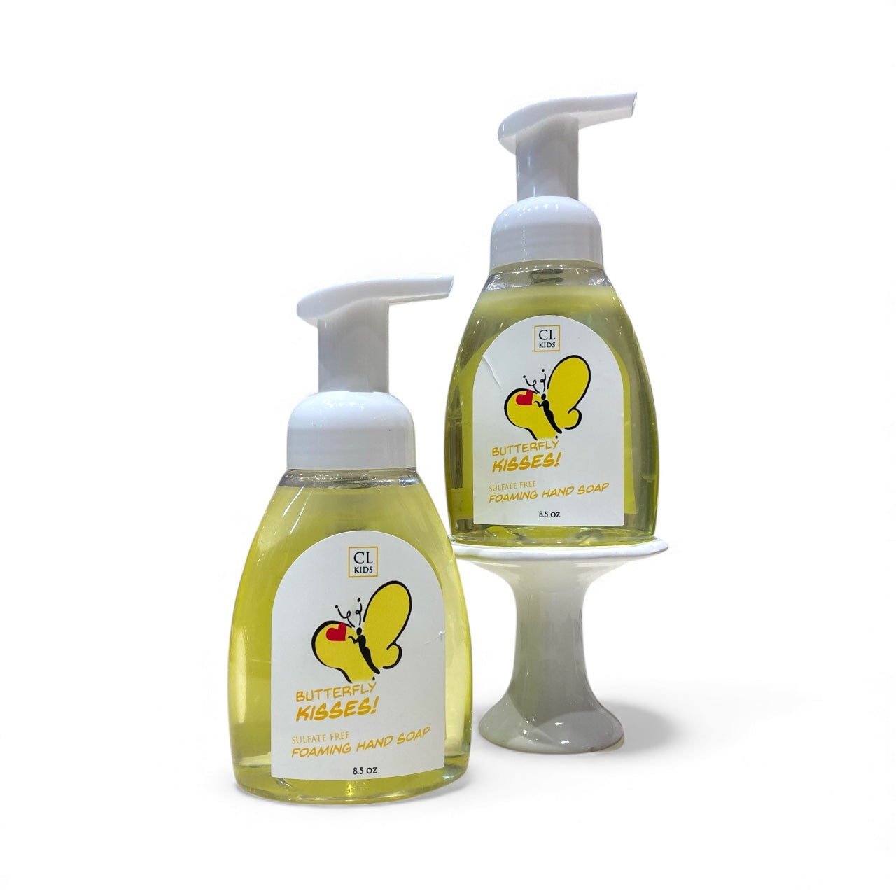 Two bottles of CL Kids Foaming Hand Soap with butterfly design on labels against a white background
