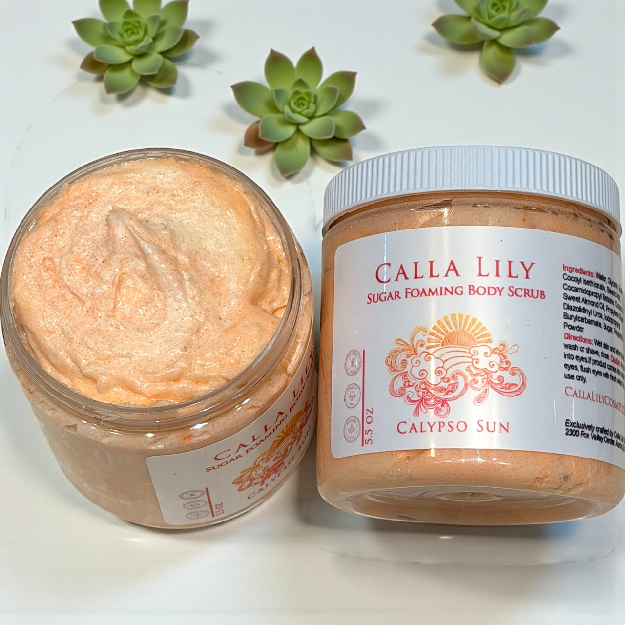 Calla Lily Sugar Foaming Body Scrub jar with open lid on a light background