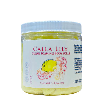 Jar of Calla Lily Sugar Foaming Body Scrub on a wooden surface