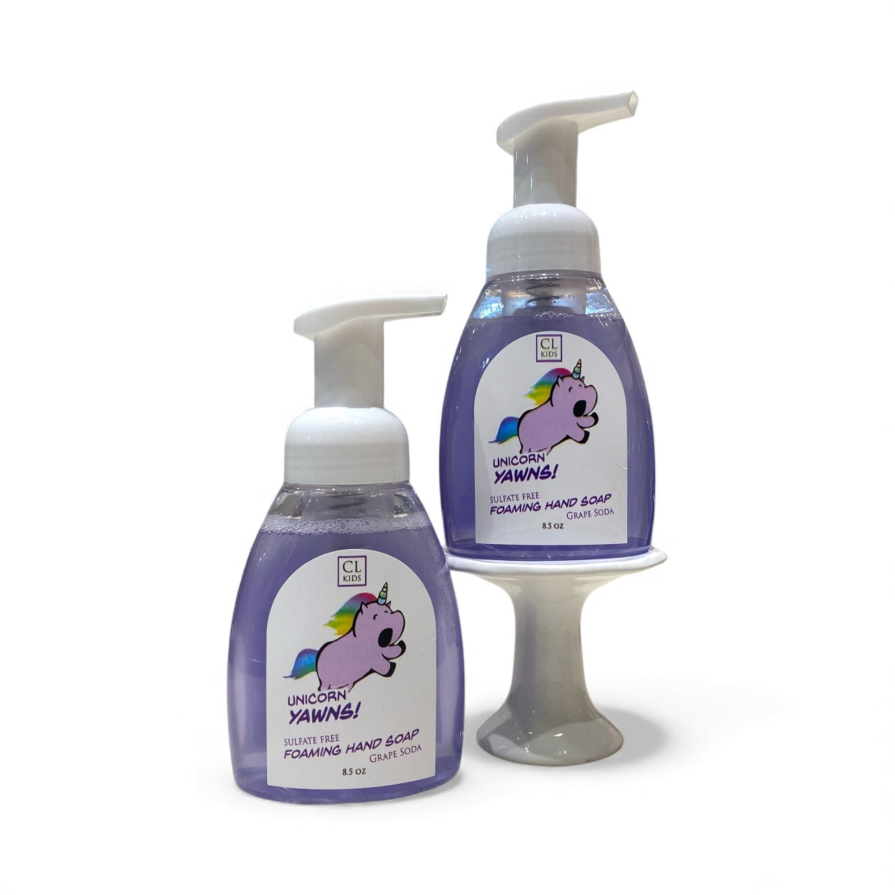 Two bottles of CL Kids Unicorn Yawning foaming hand soap on a white background