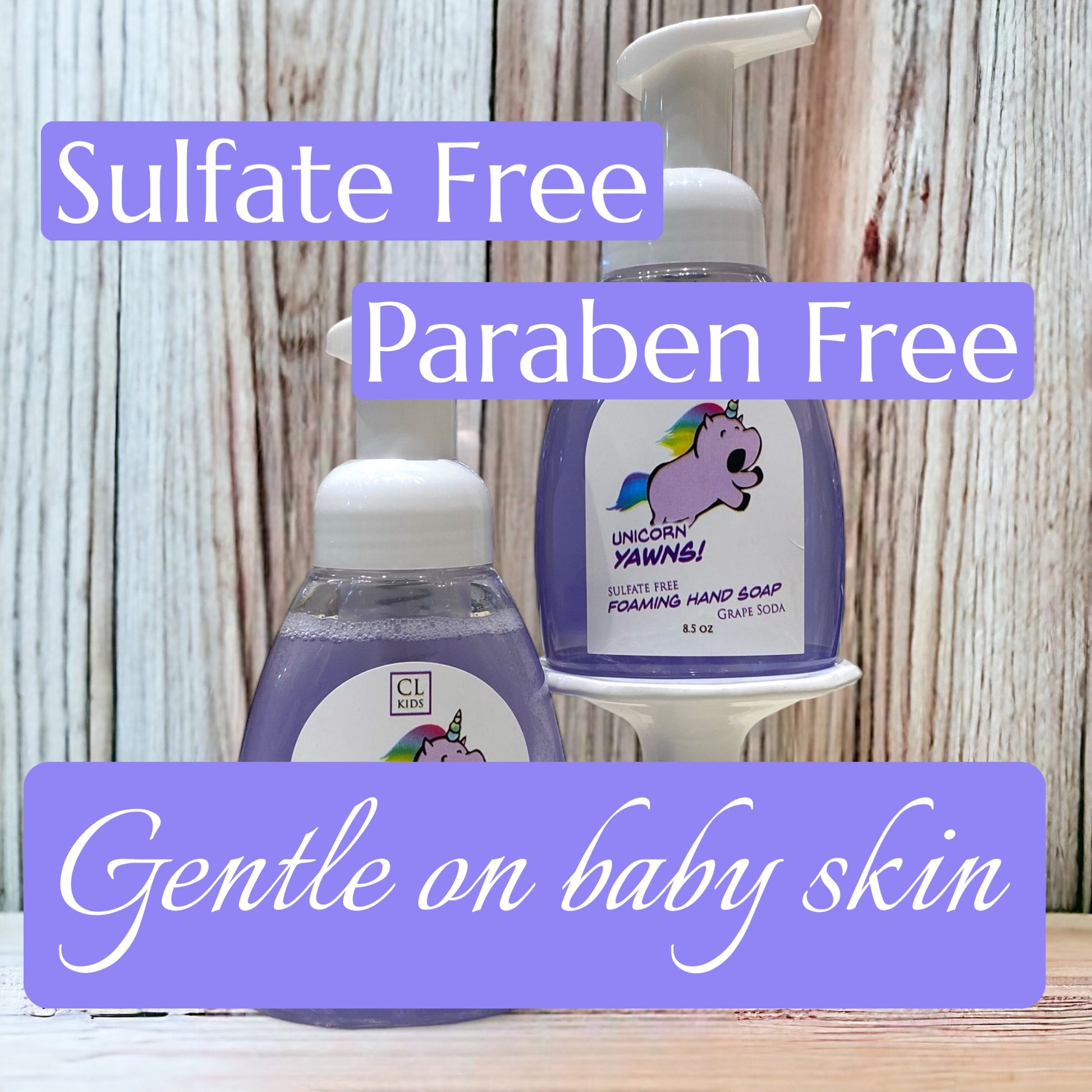 Purple bottles of soap with text indicating sulfate and paraben-free properties on a wooden background